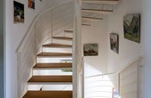Das weltweit erste Passivhaus in Darmstadt-Kranichstein wurde 2015 um eine PV-Anlage ergänzt, die das Reihenhaus seither zum Passivhaus Plus machen. (Copyright © Peter Cook)